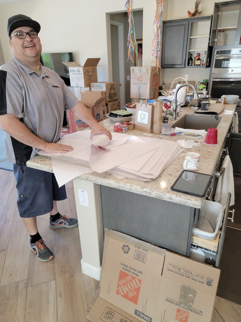 Moving-Pros-LLC-packing-home-items-768x1024